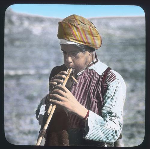 Shepherd boy playing his flute