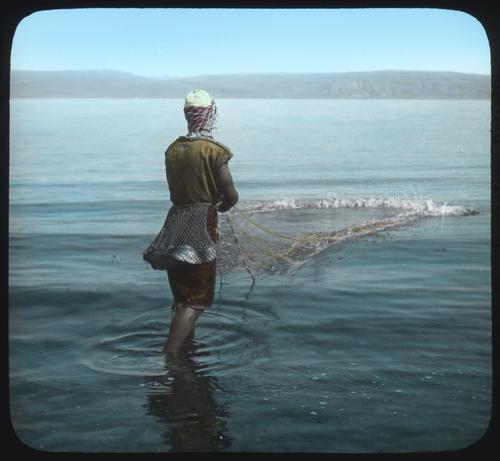 Fisherman casting his Net.